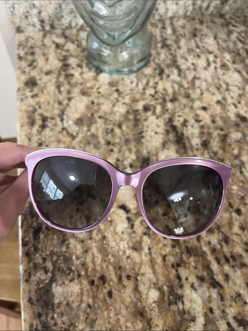 Women’s purple Michael Kors Windsor sunglasses.